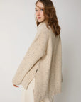 W5-53032 Maglia Dolcevita in Lana con Spacchi